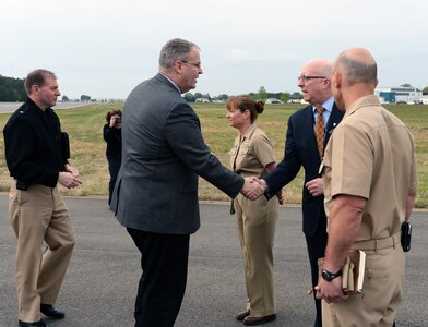 Deputy Secretary of Defense Bob Work shakes hands with leadership at the Naval Surface Warfare Center Dahlgren Division, Dahlgren, VA on April 30, 2015.