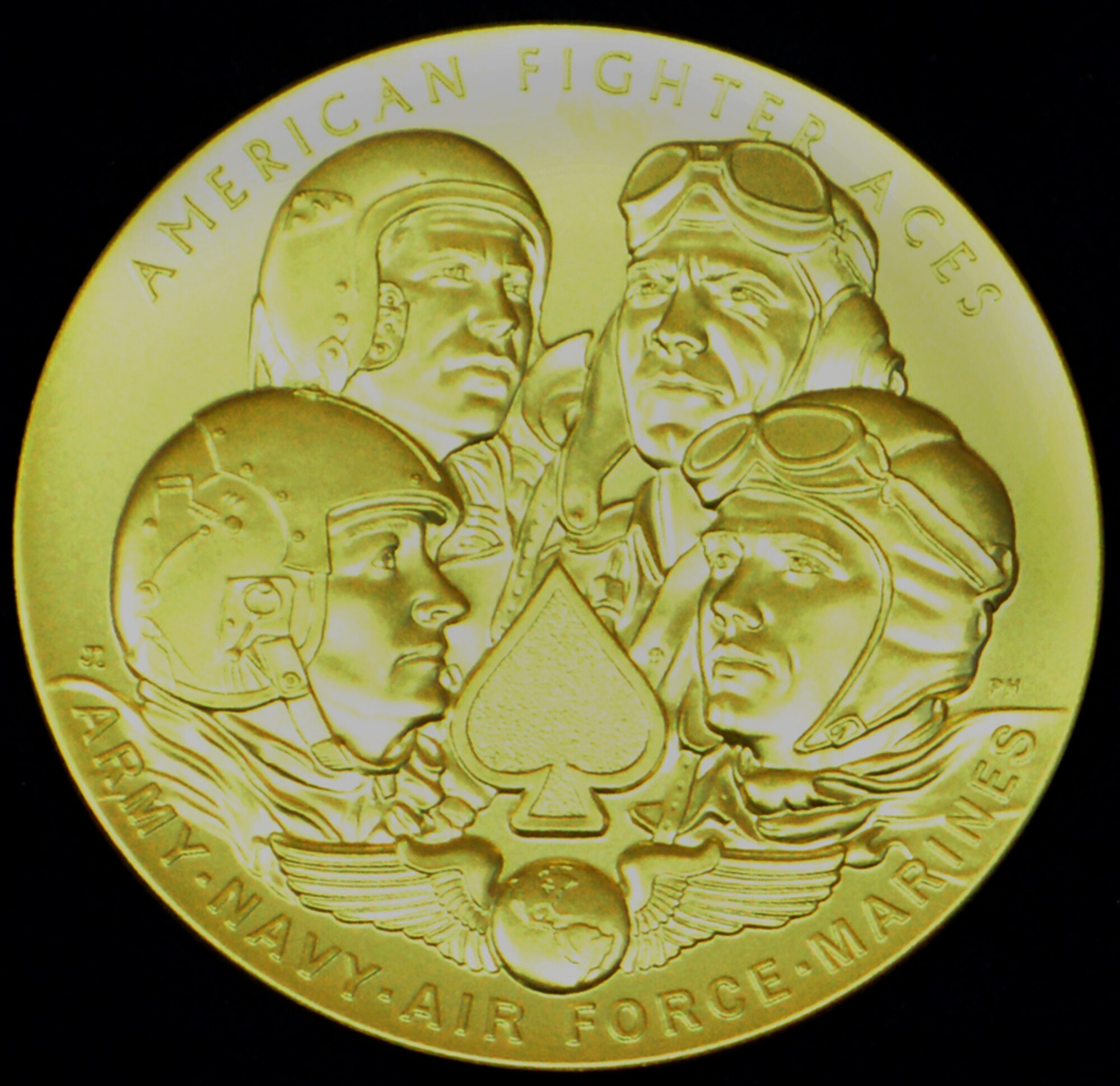 The Congressional Gold Medal was presented to the American Fighter Aces Association May 20, 2015, at the U.S. Capitol Visitor Center Emancipation Hall. The medal is the highest civilian honor Congress can give on behalf of the American people. (U.S. Air Force photo illustration/Staff Sgt. Torri Ingalsbe) 