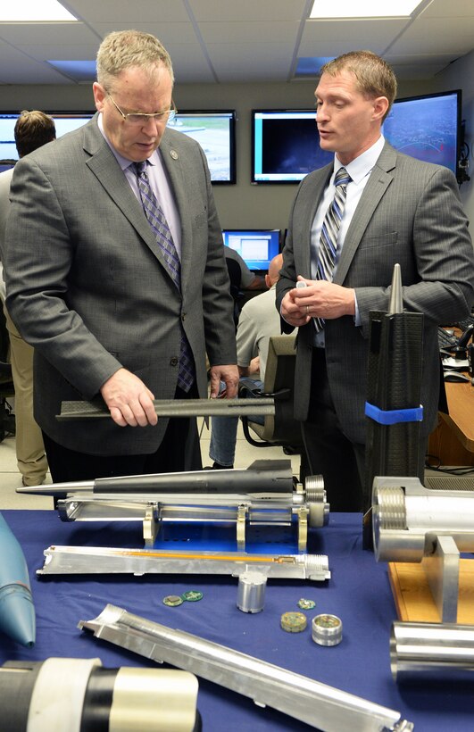 Deputy Secretary of Defense Bob Work is being shown the different types of hypervelocity projectile during his visit to the Naval Surface Warfare Center Dahlgren Division, Dahlgren, VA on April 30, 2015.