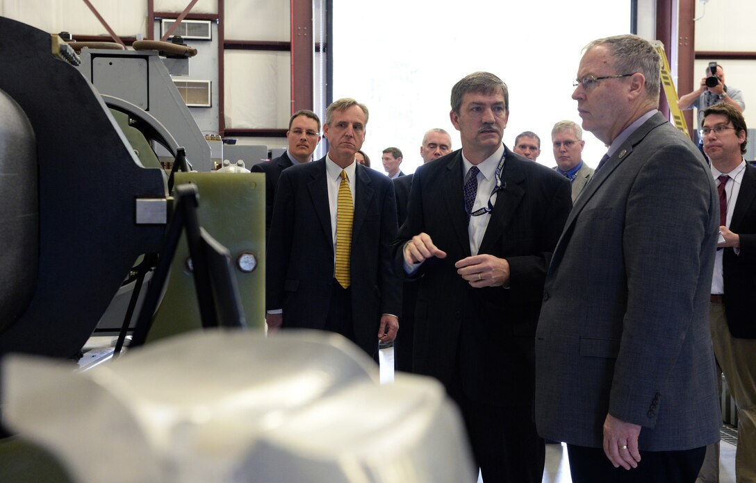 Deputy Secretary of Defense Bob Work getting briefed on the a railgun at the Naval Surface Warfare Center Dahlgren Division, Dahlgren, VA on April 30, 2015.