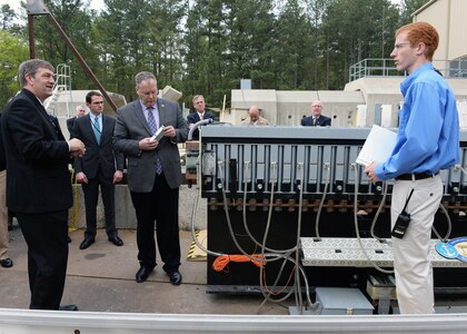 Deputy Secretary of Defense Bob Work is being briefed on the Electromagnetic Launch Facility at the Naval Surface Warfare Center Dahlgren Division, Dahlgren, VA on April 30, 2015.