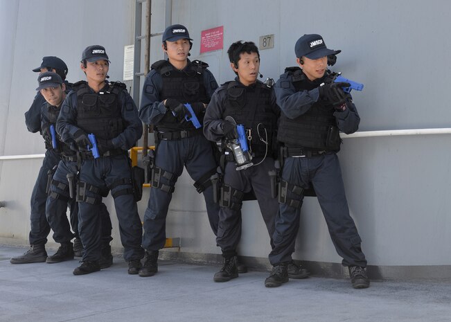 PACIFIC OCEAN (Aug. 6, 2014) Japan Maritime Self-Defense Force Sailors clear the deck onboard USNS Henry J. Kaiser (T-AO 187) during a live exercise for Fortune Guard 2014. Fortune Guard is the region’s premier exercise designed to build regional weapons of mass destruction counter-proliferation capacity and long-term commitment to the proliferation security initiative in the Indo-Asia-Pacific. (U.S. Navy photo by Mass Communication Specialist 1st class Amanda Dunford/Released).