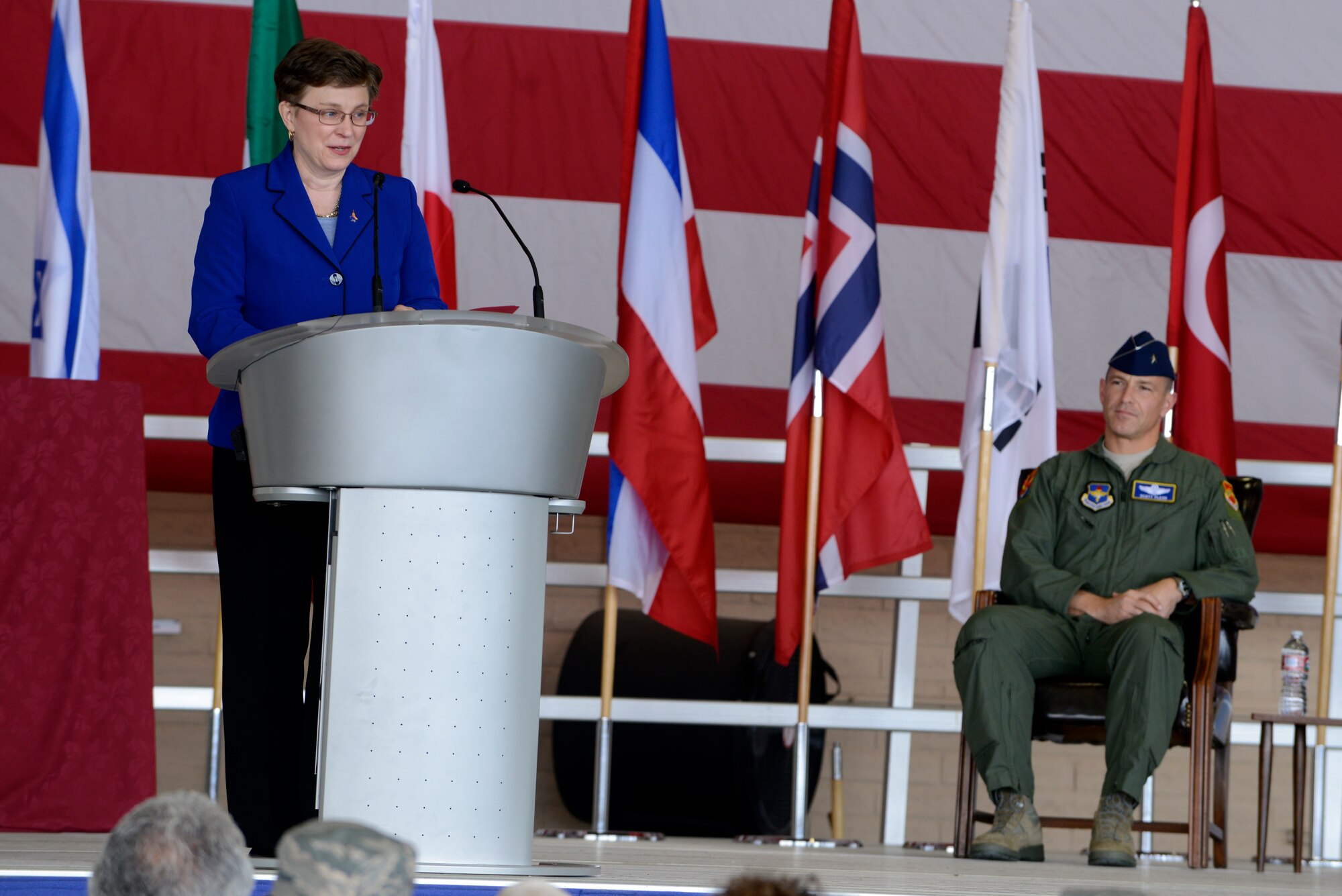 Lorraine M. Martin, Lockheed Martin’s Executive Vice President and General Manager of the F-35 Lightning II Program, speaks with the audience during the 56th Fighter Wing Change of Mission ceremony at Luke Air Force Base, Arizona, May 21, 2015. (U.S. Air Force photo by Senior Airman Devante Williams)