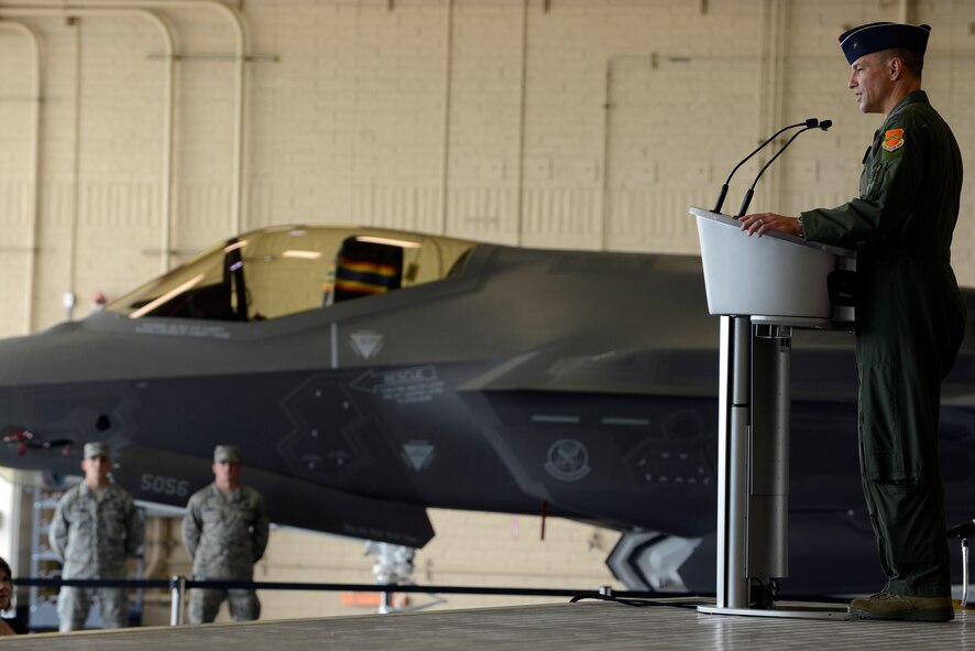 Brig. Gen. Scott Pleus, 56th Fighter Wing commander, speaks to the audience during the 56th Fighter Wing Change of Mission ceremony at Luke Air Force Base, Arizona, May 21, 2015. The 56th FW’s new mission statement is to “Train the world’s greatest F-35 and F-16 fighter pilots.”  (U.S. Air Force photo by Senior Airman Devante Williams)