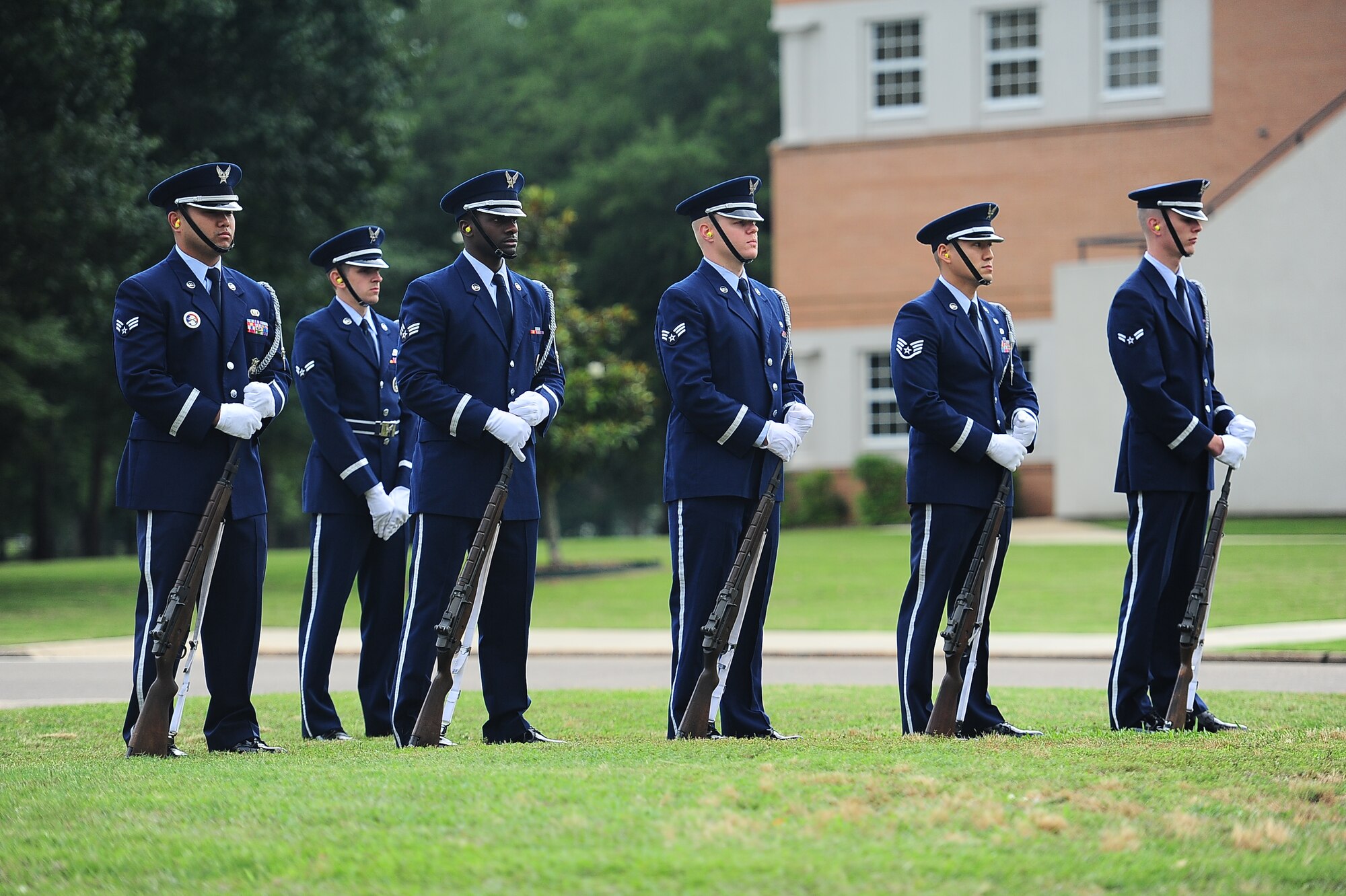 14th Flying Training Wing Honor Guardsmen stand at ceremonial at ease before performing Firing Party for a 14 FTW Memorial Day retreat May 21, 2014 on Columbus Air Force Base, Mississippi. The 14th FTW holds a retreat ceremony each year to honor fallen service members. (U.S. Air Force photo/Airman Daniel Lile)