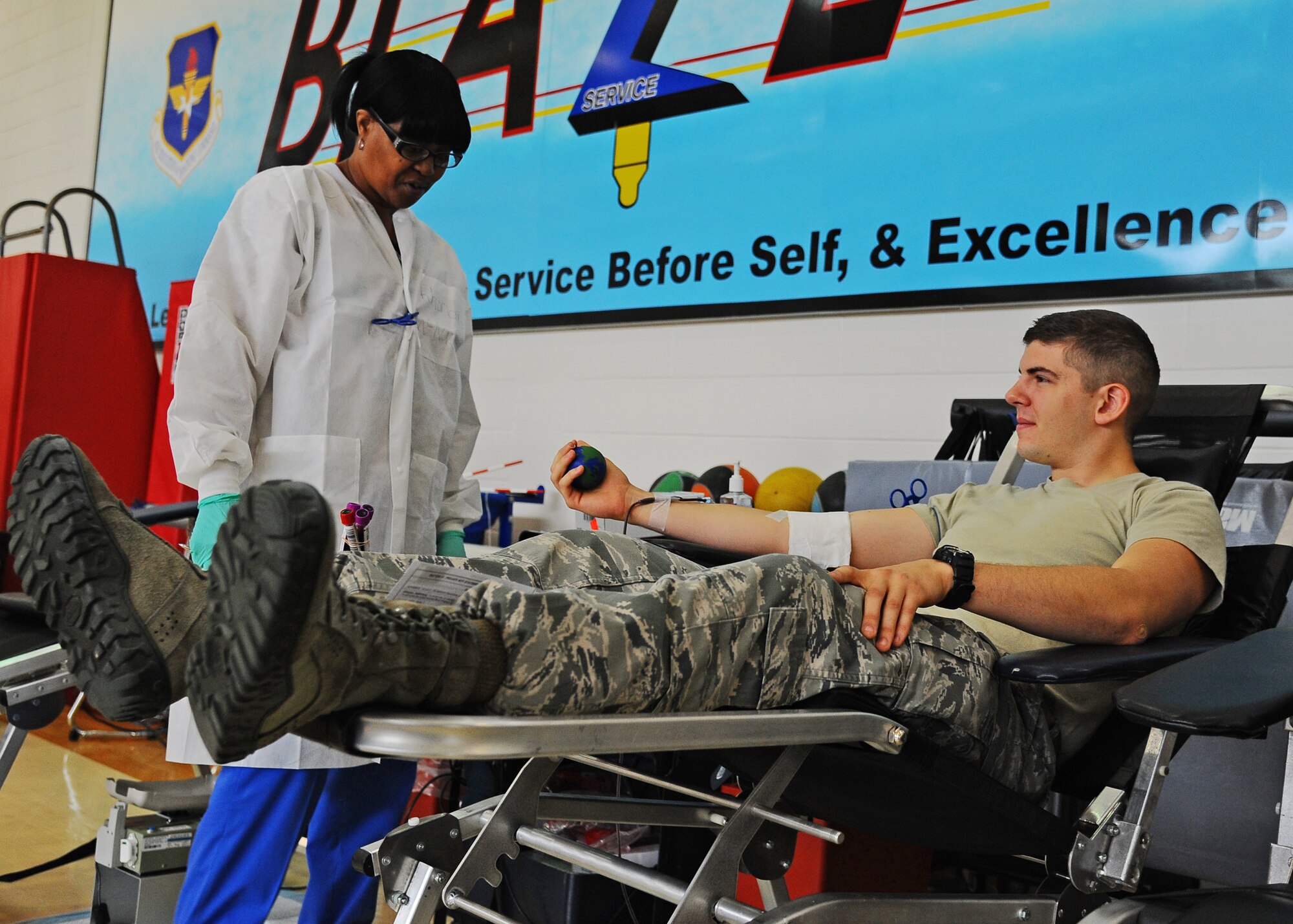 Second Lt. Christian Lindenberg, 14th Student Squadron, donates blood May 20 during the second Blood Drive this year. This drive was sponsored by the Armed Services Blood Program.  All the blood collected will be used by the Department of Defense. (U.S. Air Force photo/Senior Airman Stephanie Englar)