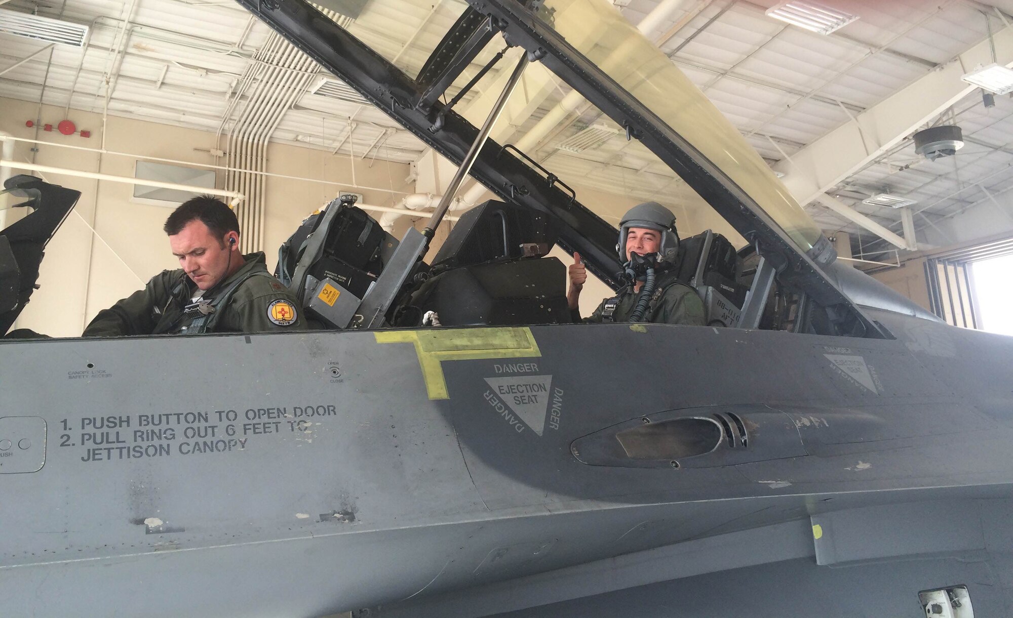 Senior Airman Aaron Feliciano, 49th Aircraft Maintenance Squadron Reaper aircraft maintenance unit avionics technician poses for a photo before his familiarization flight May 13, 2015 at Holloman Air Force Base, N.M. Feliciano, Air Combat Command’s Outstanding Airman of the Year, received his familiarization flight after a visit where he was recognized by ACC commander, Gen. Herbert “Hawk” Carlisle. (Courtesy photo)