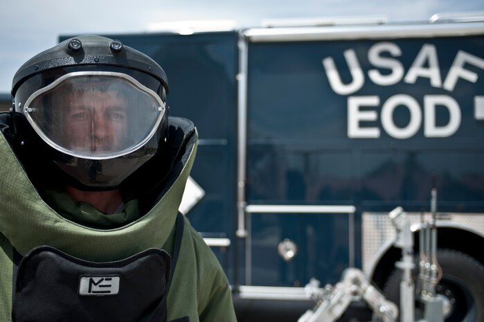 Senior Airman Kalin Fuller, 99th Civil Engineer Squadron explosive ordnance disposal journeyman looks out from inside of EOD’s bomb suit at Nellis Air Force Base, Nev., May 13, 2015. EOD Airmen have jurisdiction for military munitions found off base, but they can be called out to any sort of suspicious package if local authorities want advice or assistance. (U.S. Air Force photo by Airman 1st Class Jake Carter)