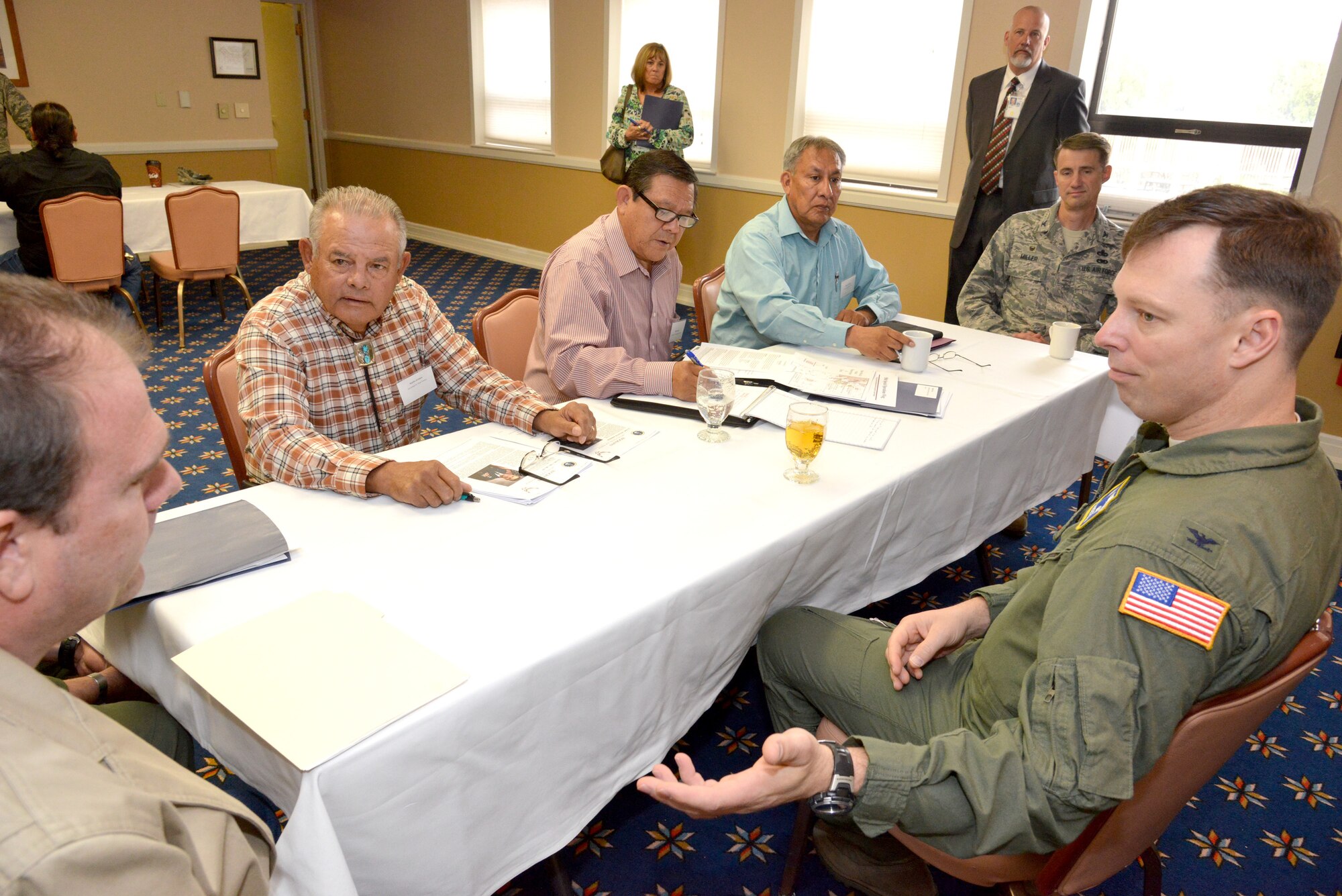 Col. Dagvin Anderson (right), 58th Special Operations Wing commander, listens to the concerns about low-flying aircraft from pueblo governors. (Photo by Ken Moore) 
