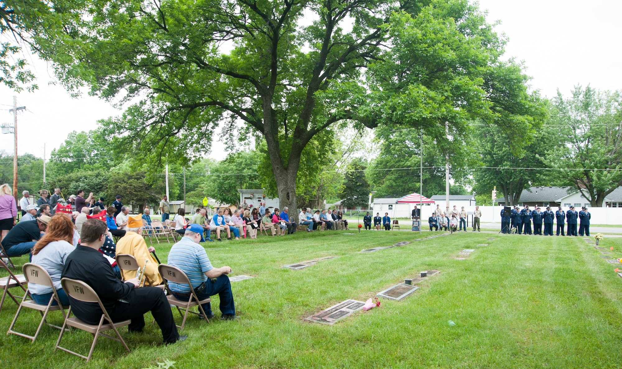 Community members and Airmen from Whiteman Air Force Base gather May 16, 2015, in Sedalia, Mo., for the annual wreath-laying ceremony recognizing 2nd Lt. George Whiteman’s sacrifice. The nearby base was named after the lieutenant, who was only 22 years old when he became one of the first Airmen killed during World War II.(U.S. Air Force photo by Staff Sgt. Brigitte N. Brantley/Released)