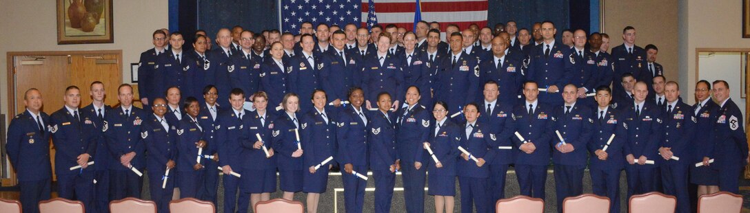 A ceremony honoring 268 Kirtland Airmen who recently graduated from the Community College of the Air Force took place May 13 at the Mountain View Club. (Photo by Dennis Carlson)