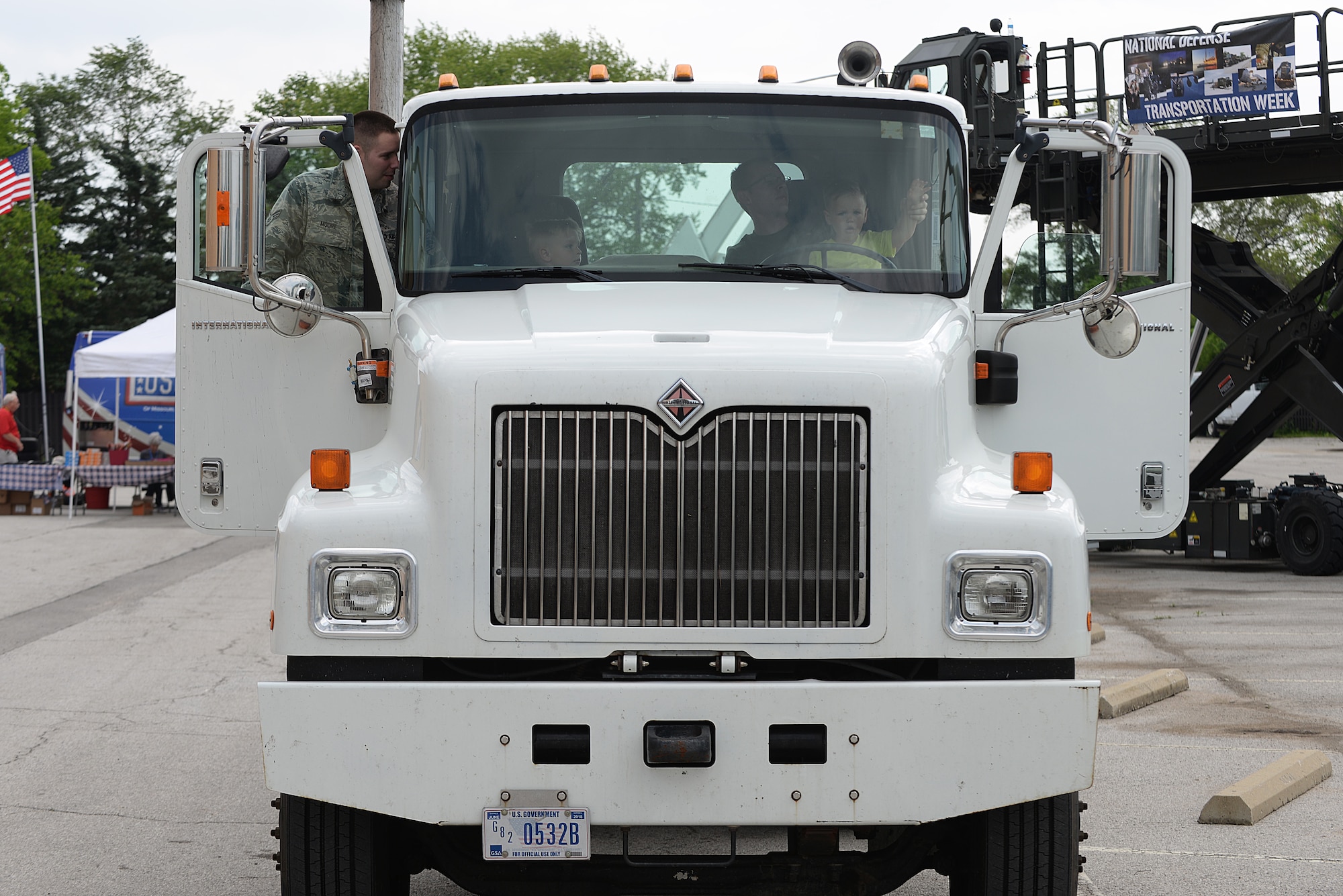 Scott Air Force Base members and their families got the opportunity to attend an Open House event put on by the 375 Logistics Readiness Squadron at Vehicle Operations Bldg. 548 May 15, 2015 at Scott AFB, Illinois. The 375 LRS had static displays for visitors to experience what it is like to sit behind the wheel of the many different vehicles they utilize. (U.S. Air Force photo/Senior Airman Joshua Eikren)