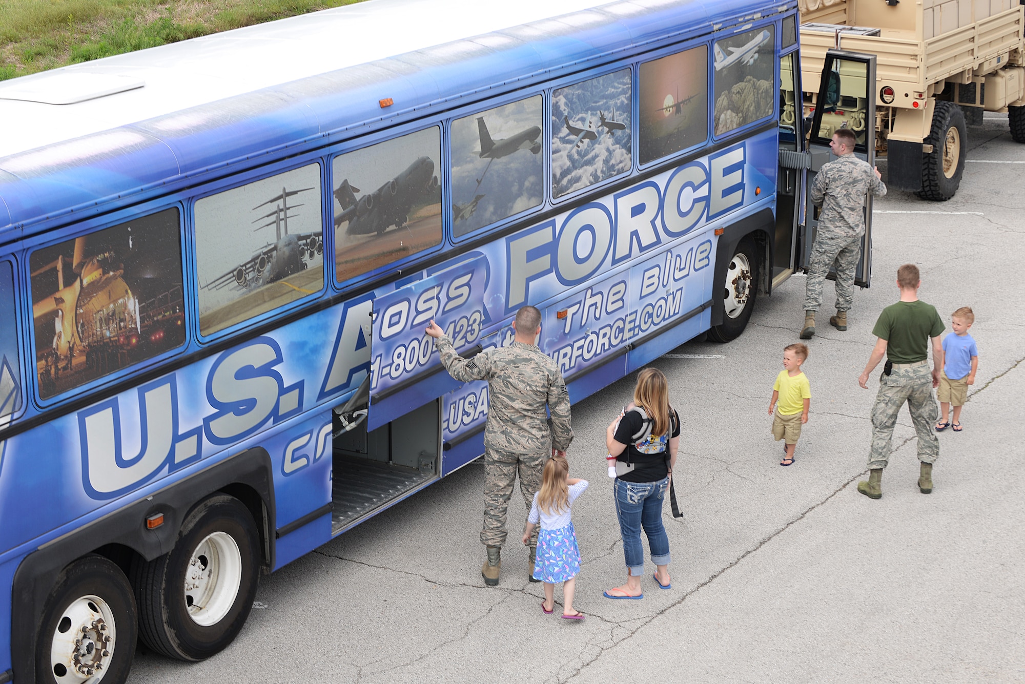 Scott Air Force Base members and their families got the opportunity to attend an Open House event put on by the 375 Logistics Readiness Squadron at Vehicle Operations Bldg. 548 May 15, 2015 at Scott AFB, Illinois. The 375 LRS had static displays for visitors to experience what it is like to sit behind the wheel of the many different vehicles they utilize. (U.S. Air Force photo/Senior Airman Joshua Eikren)