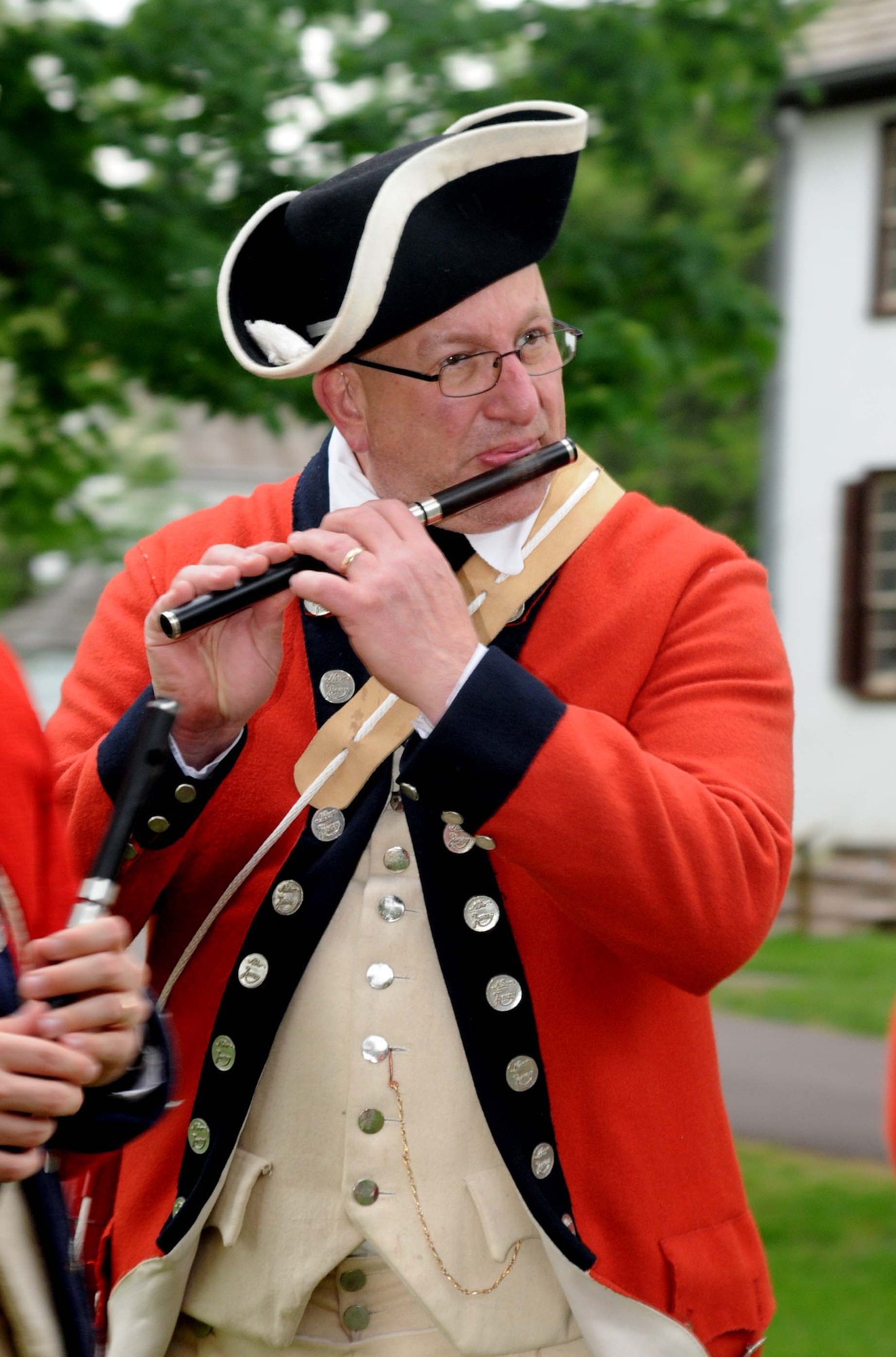 Nick Sciarrotta of the Old Barracks Fife and Drum Corps, a part of the Friends of Washington Crossing Park Reenactors, plays the fife during the distinguished service award dinner for retired Maj. Gen. Wesley Craig May 16, 2015, Washington Crossing Historic Park, Washington Crossing, Pennsylvania. Craig, formerly The Adjutant General of the Pennsylvania National Guard, was presented with the 2015 Mary G. Roebling Award. (U.S. Air National Guard photo by Tech. Sgt. Andria Allmond/Released)