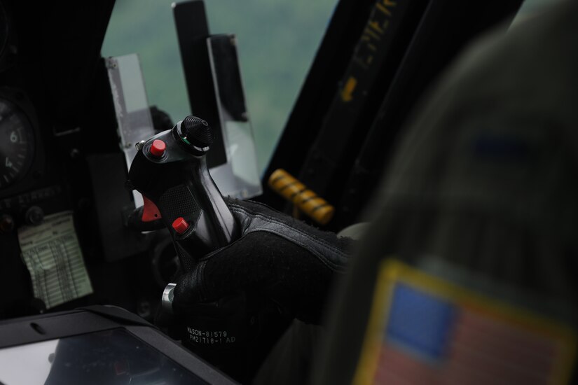 1st Lt. Jacob Pomerenke, 1st Helicopter Squadron special missions pilot, flies a UH-1N Twin Huey at Camp Dawson, W.Va., May 15, 2015. The 1st Helicopter Squadron undertook mountain flying training in addition to the natural disaster preparedness exercise. (U.S. Air Force photo/ Airman 1st Class J.D. Maidens) 