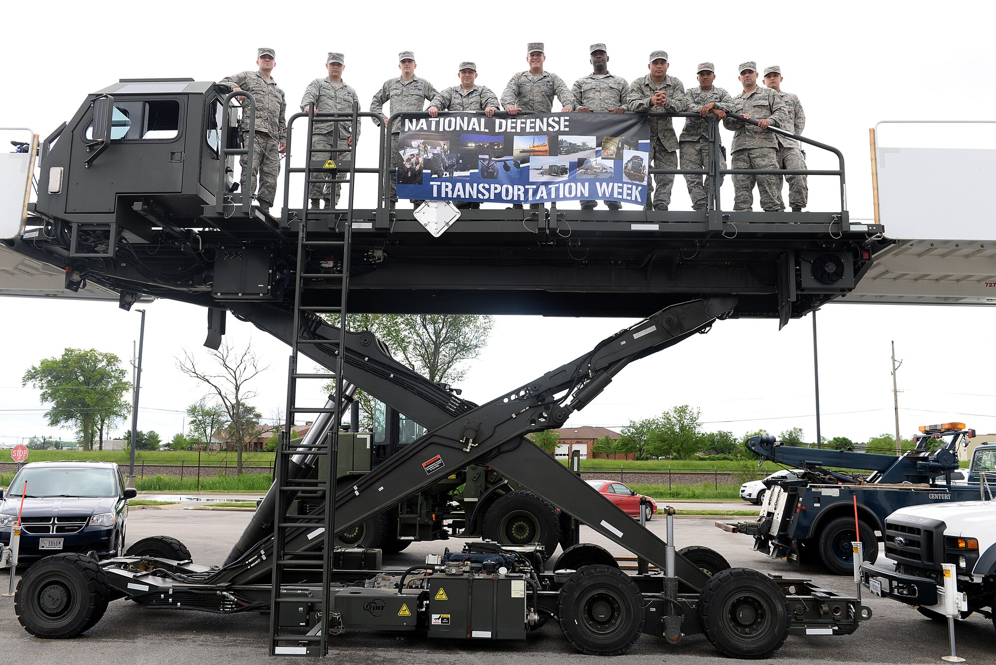 Members of the 375 Logistics Readiness Squadron were on hand to talk to visitors about their career fields and the different vehicles they use to Enable Rapid Global Mobility May 11, 2015 at Scott Air Force Base, Illinois. The 375 LRS had static displays on hand to showcase what different vehicles are used on Scott. (U.S. Air Force photo/Senior Airman Joshua Eikren)