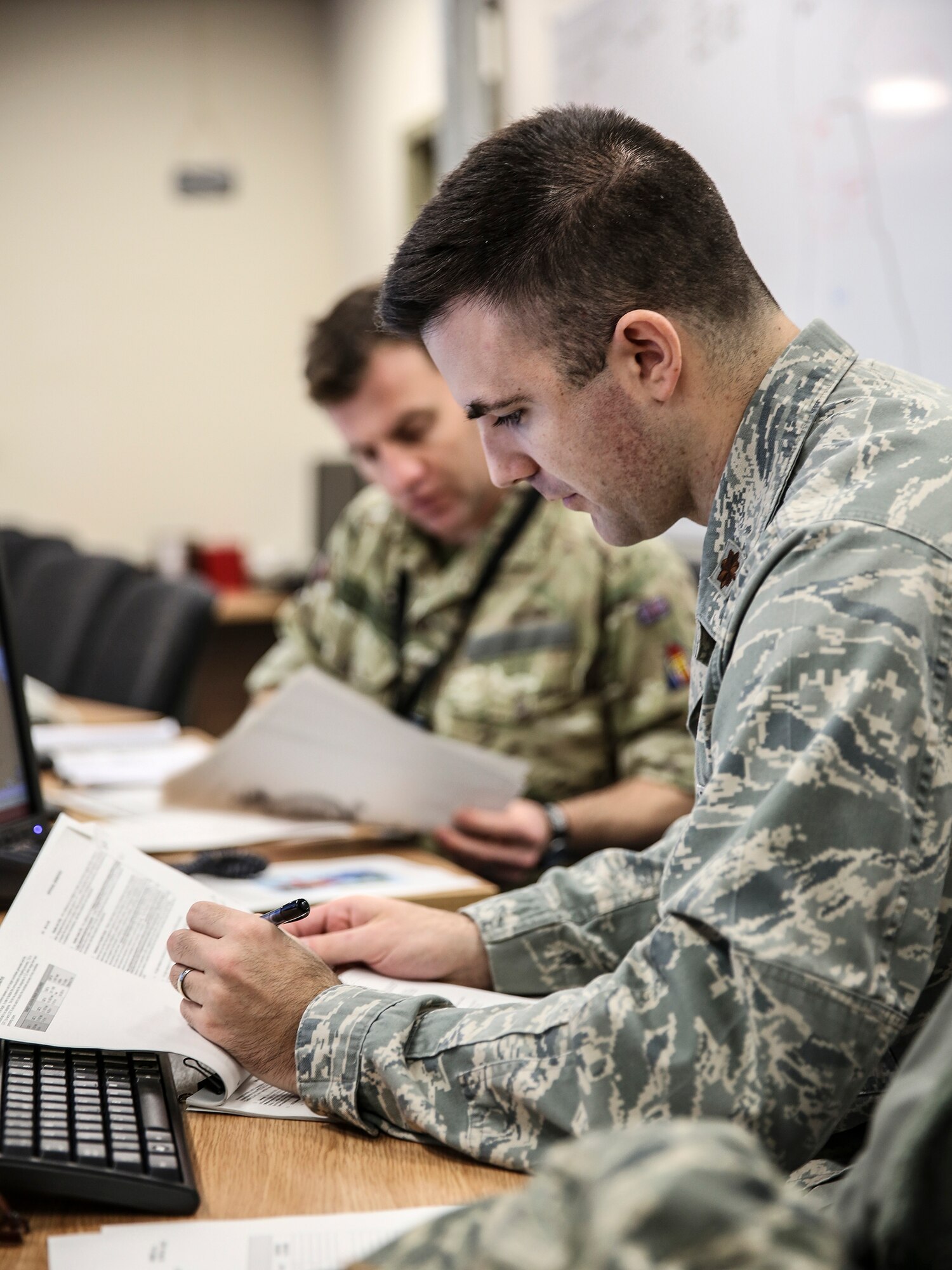 Maj. Dustin Lane, Royal Air Force High Wycombe judge advocate, performs his job as an exchange officer Feb. 10, 2013.  Lane is one of more than 130 Airmen involved in the exchange program in more than 26 countries worldwide. (Courtesy photo) 