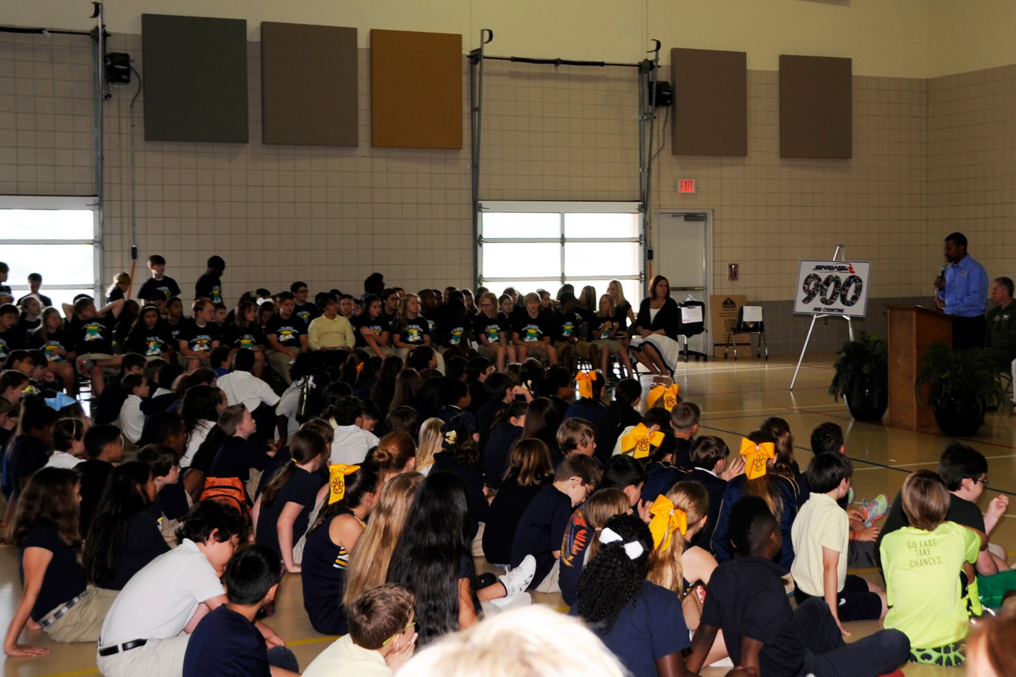 On May 19, 2015, one of the STARBASE instructors at W.T. Lewis Elementary School in Bossier City, La. nicknamed “Ice Man”, because he says, “Cool” so much, calls on four graduates of the 900th STARBASE Class to exhibit Newton’s Laws of Forces and Motion to the audience. The students demonstrated the results of a collision when you don’t use restraints by crashing two chairs into each other. Each chair had a stuffed animal; one properly restrained the other not. (U.S. Air Force photo by Master Sgt. Laura Siebert/Released)