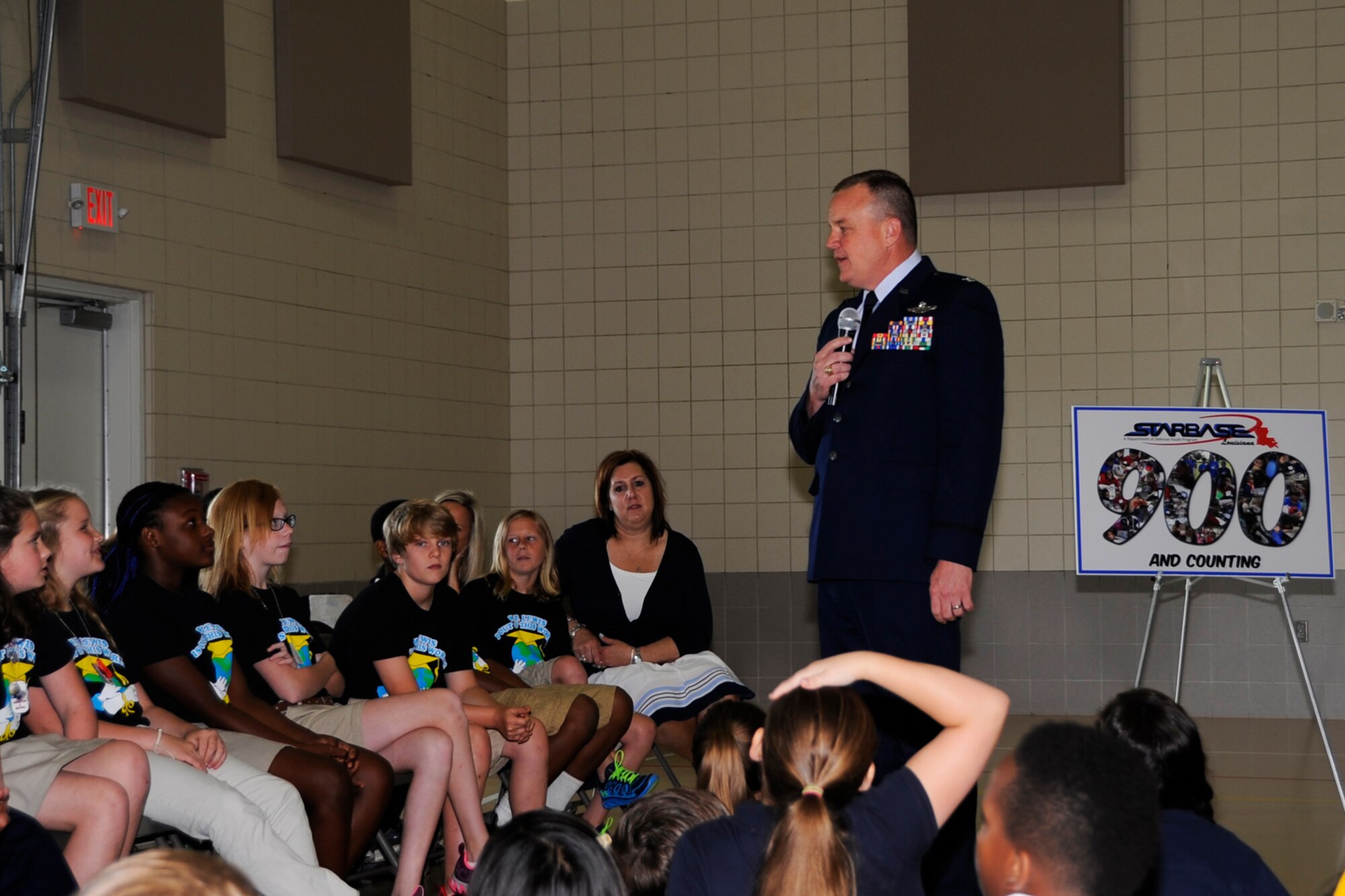 U.S. Air Force Reserve Col. Bruce Cox, Commander of the 307th Bomb Wing, addresses graduates of the 900th STARBASE Class at W.T. Lewis Elementary School in Bossier City, La. on May 19, 2015. The STARBASE program provides a 25-hour hands-on minds-on STEM (science, technology, engineering, and mathematics) curriculum to area 5th grade students and their teachers. (U.S. Air Force photo by Master Sgt. Laura Siebert/Released)