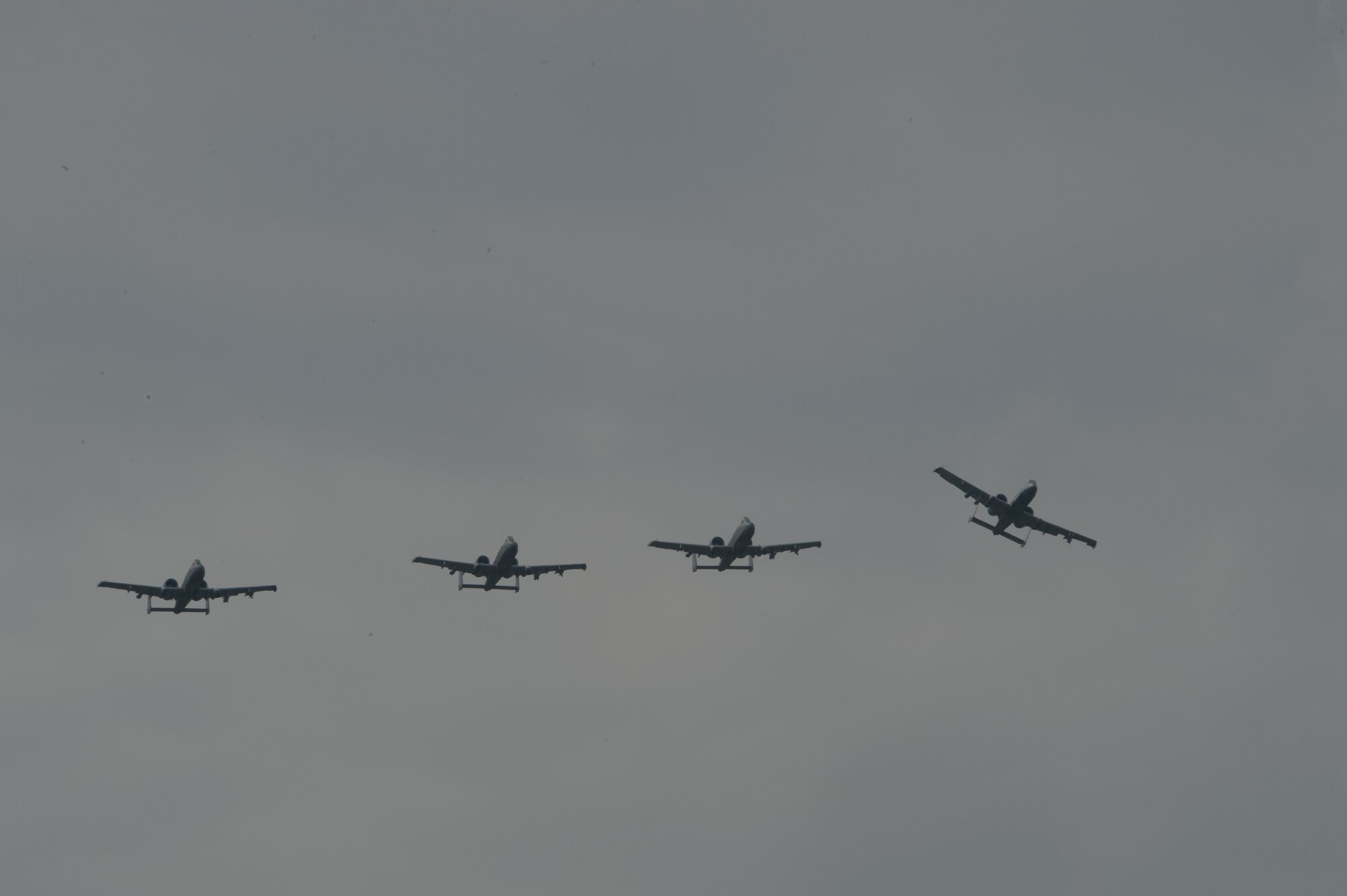 A U.S. Air Force A-10 Thunderbolt II attack aircraft assigned to the 354th Expeditionary Fighter Squadron breaks from formation during a theater security package deployment at Sliac Air Base, Slovakia,  May 20, 2015. As part of the deployment, the U.S. and Slovakia air forces will train together May 18-22 to improve interoperability in allied air operations and multinational close-air-support operations. (U.S. Air Force photo by Senior Airman Dylan Nuckolls/Released)