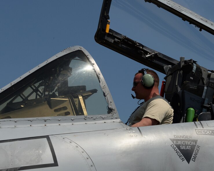 A U.S. Air Force maintenance Airman assigned to the 354th Expeditionary Fighter Squadron runs a test on an A-10 Thunderbolt II aircraft during a theater security package deployment at Sliac Air Base, Slovakia, May 19, 2015. The U.S. Air Force’s forward presence in Europe allows cooperation among NATO allies and partners to develop and improve ready air forces capable of maintaining regional security. (U.S. Air Force photo by Senior Airman Dylan Nuckolls/Released)