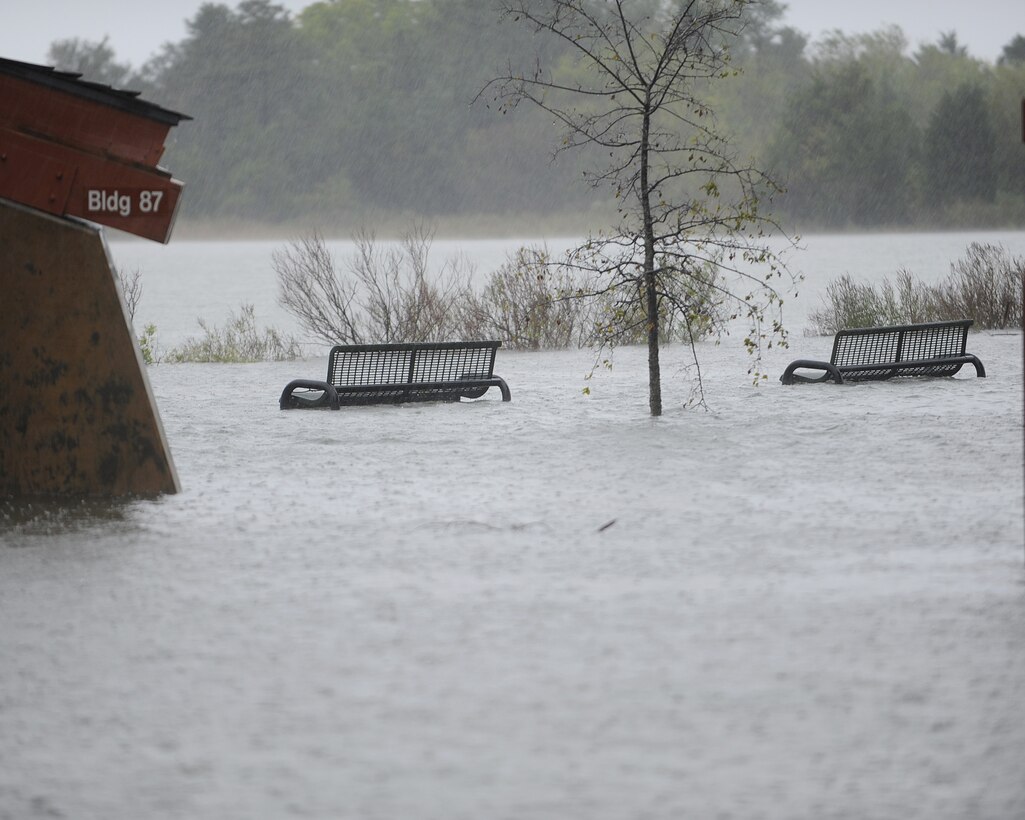 The Back River spills over the seawall into Eagle Park at Langley Air Force Base, Va., during Hurricane Sandy, Oct. 29, 2012. The 633rd Civil Engineer Squadron provides a biweekly Base Emergency Preparedness Orientation class for anyone new to the installation to provide information and resources they may need in case of a natural disaster such as a hurricane or flood. (U.S. Air Force photo by Staff Sgt. Antoinette Gibson/Released)