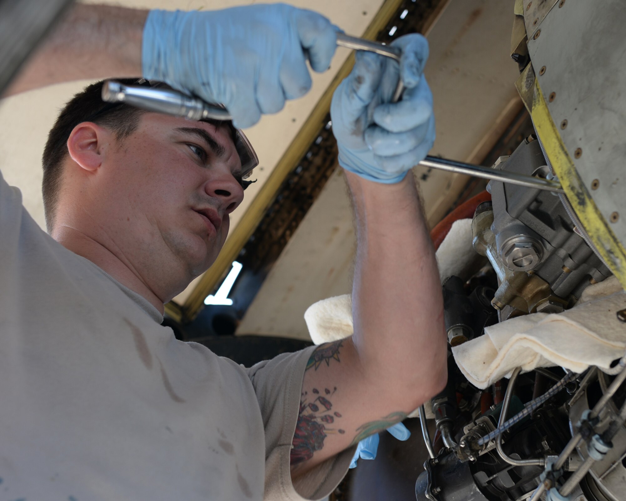 A U.S. Air Force maintenance Airman assigned to the 354th Expeditionary Fighter Squadron replaces a hydro-pump during a theater security package deployment at Sliac Air Base, Slovakia, May 19, 2015. As part of the deployment, the U.S. and Slovakia air forces will train together May 18-22 to improve interoperability in allied air operations and multinational close-air-support operations. (U.S. Air Force photo by Senior Airman Dylan Nuckolls/Released)