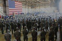 Members of the Wolf Pack attend the 8th Fighter Wing change of command ceremony at Kunsan Air Base, Republic of Korea, May 21, 2015. Approximately 600 Airmen looked on as Col. Ken Ekman, “Wolf” 54, relinquished command to Col. Jeremy Sloane, “Wolf” 55. (U.S. Air Force photo by Senior Airman Divine Cox/Released)