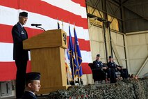 Col. Jeremy “Wolf” Sloane, 8th Fighter Wing commander, speaks to members of the Wolf Pack during the 8th FW change of command ceremony at Kunsan Air Base, Republic of Korea, May 21, 2015. Approximately 600 Wolf Pack Airmen looked on as Col. Ken Ekman, “Wolf” 54, relinquished command to Sloane. (U.S. Air Force photo by Senior Airman Divine Cox/Released)