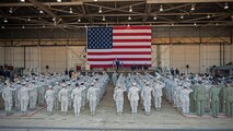 Col. Jeremy “Wolf” Sloane, 8th Fighter Wing commander, salutes the Wolf Pack for the first time during a change of command ceremony at Kunsan Air Base, Republic of Korea, May 21, 2015. Sloane accepted command from Lt. Gen. Terrence O’Shaughnessy, 7th Air Force and Air Component Command U.S. Forces Korea/U.S. Combined Forces commander during the ceremony. (U.S. Air Force photo by Senior Airman Katrina Heikkinen/Released)
