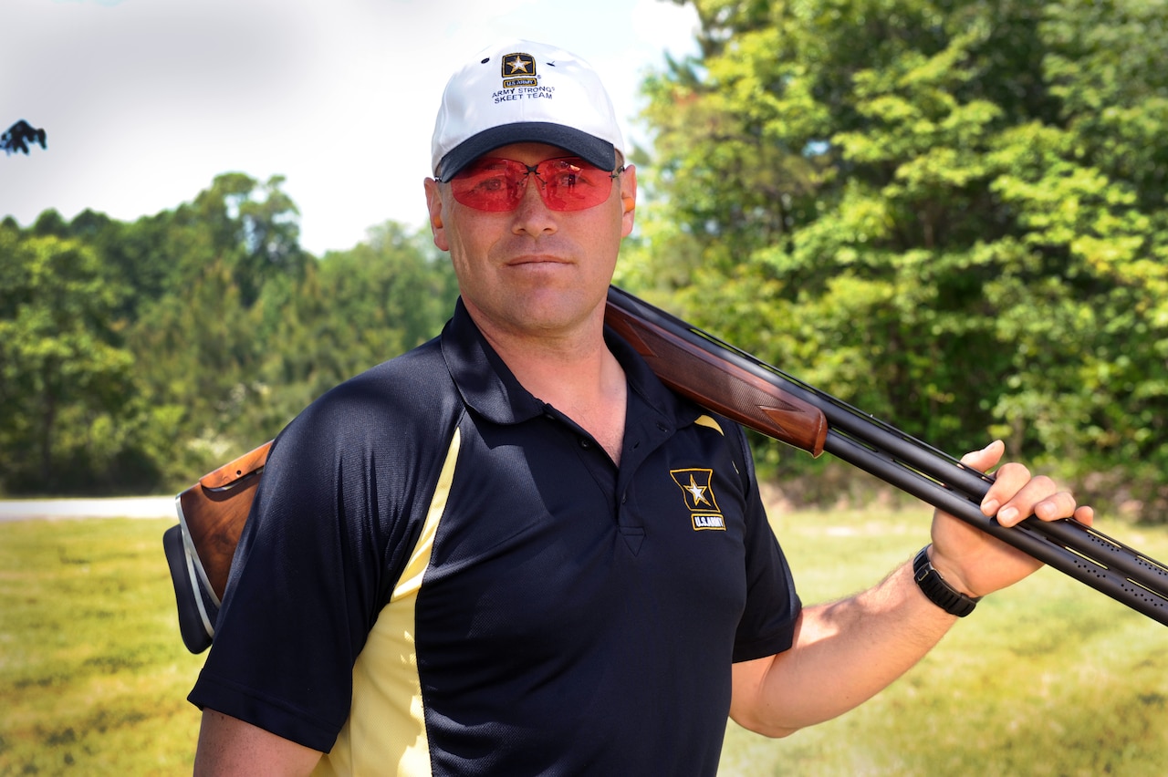 Army Maj. David Guida, a Crosby-Ironton, Minn., native and member of the Army Skeet Team, got his love of shooting from his family growing up and he shares it with his own children. DoD photo by Marvin Lynchard