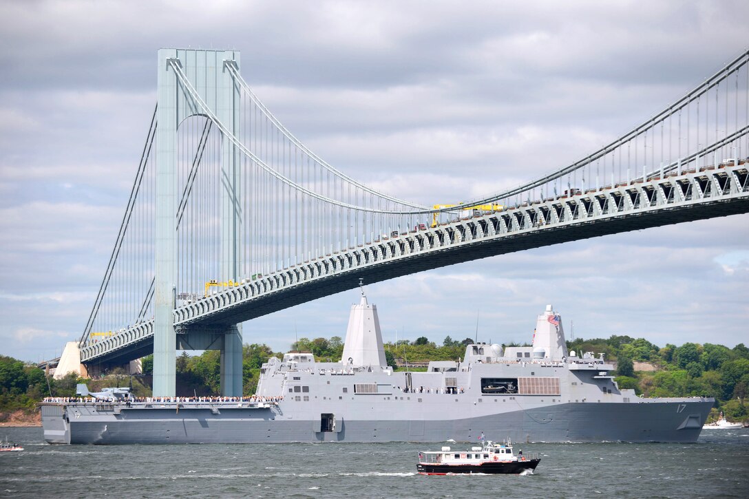 The U.S. Navy amphibious transport dock ship USS San Antonio enters New York Harbor during the Parade of Ships to kick off Fleet Week New York, May 20, 2015. 