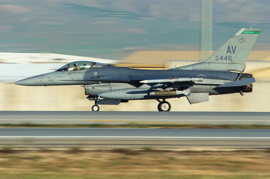 A U.S. Air Force F-16 Fighting Falcon aircraft lands at Bagram Airfield, Afghanistan, May 13, 2015. The pilot is assigned to the 555th Expeditionary Fighter Squadron from Aviano Air Base, Italy.