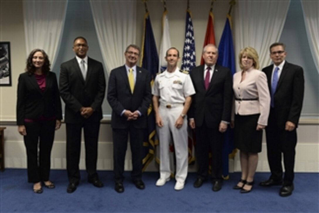 Defense Secretary Ash Carter, third from left, and Frank Kendall, third from right, the undersecretary of defense for acquisition, technology and logistics, attend the 2014 David Packard Award Ceremony at the Pentagon, May 21, 2015.