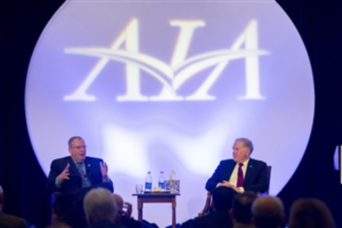 Deputy Defense Secretary Bob Work, left, and Frank Kendall, undersecretary of defense for acquisition, technology and logistics, participate in the Aerospace Industries Association executive committee conference at the Williamsburg Lodge in Williamsburg, Va., May 21, 2015.