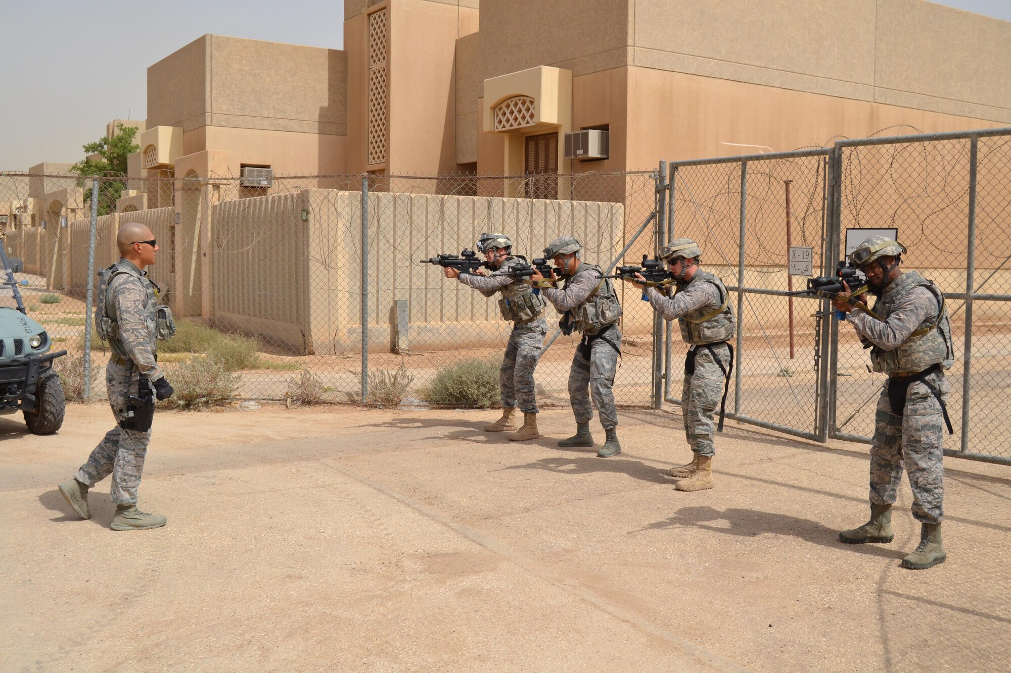 Airmen from the 879th Expeditionary Security Forces Squadron train active shooter neutralization tactics as part of the Air Force Central Command initiative  'Check Six' May 19, 2015 at Eskan Village, Saudi Arabia. Eskan Village is a housing community home to the United States military training mission to Saudi Arabia, a vital part of the strategic relationship between the United States and the Kingdom of Saudi Arabia. The 879th Expeditionary Security Forces Squadron is the 379th Air Expeditionary Wing's only geographically separated unit. (U.S. Air Force photo/ Senior Airman Kristopher Bennett)