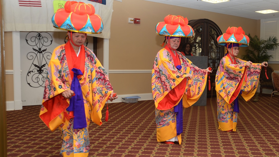 Performers from the South Georgia Okinawa Club entertain the crowd with a series of dances during the Asian-American and Pacific Islander Heritage Month Lunch and Learn at Marine Corps Logistics Base Albany, Georgia, May 21. The ceremony, hosted by Marine Corps Logistics Command and Marine Corps Logistics Base Albany officials, was held at MCLB Albany’s Town and Country Restaurant’s Grand Ballroom.