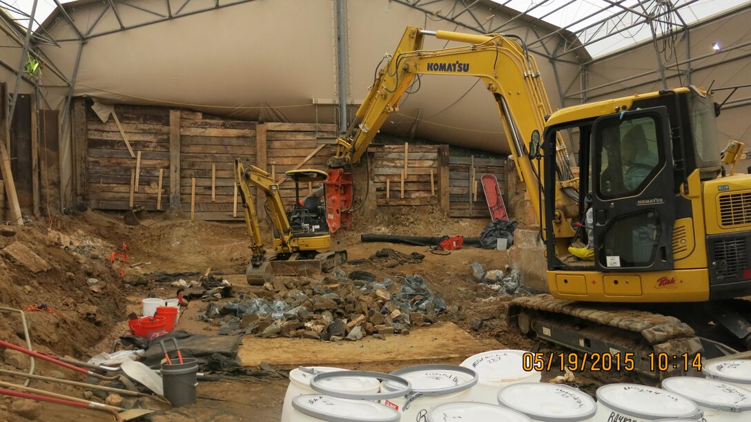 The U.S. Army Corps of Engineers, Baltimore District, continues its extensive cleanup of the property at 4825 Glenbrook Road in northwest Washington, D.C. Working carefully inside the engineering control structure, crews continued breaking up the thick concrete pad and footer, and placing the concrete rubble into drums. No munition debris or glassware was recovered this week, and there were no detections of chemical agents or industrial compounds in the air monitors. 