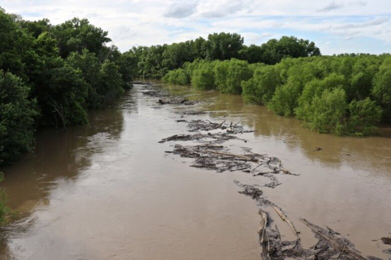 Debris moving along the flooded Verdigris River, May 16, 2015, near Independence, Kan. The Verdigris River is an Arkansas River tributary, which flows through southeastern Kansas and northeastern Oklahoma. When flooding is imminent and as it occurs, the U.S. Army Corps of Engineers, Tulsa District, provides flood fight assistance, ranging from providing sandbags and technical assistance to temporary levee construction, as requested by local authorities.