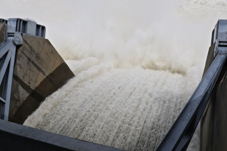 Water being released from the Lake Eufaula Dam, May 18, 2015, at a rate of approximately 62,000 cubic feet per second. The flood control area behind the dam is normally kept empty. Currently, flood waters at the Lake Eufaula Dam, in Oklahoma are at 116 percent of capacity and operating over the flood pool into the surcharge pool.