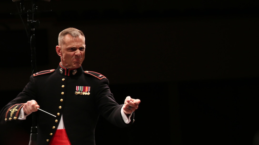 Chief Warrant Officer 3 Bryan Sherlock conducts the Marine Corps Band New Orleans during an evening concert at Foothills Alliance Church in Calgary, Alberta, May 2, 2015. The band conducted their spring tour through Canada and the northern United States April 29 – May 11, 2015. The tour included combined concerts with the HMCS Tecumseh Royal Canadian Navy Reserve Band, as well as the University of Montana wind ensemble. The band performed concerts in Calgary, Alberta, Canada; Missoula and Billings, Mont.; Rapid City, S.D., and Cheyenne, Wyo., giving the Marines a chance to tell the Marine Corps’ story through music across North America.