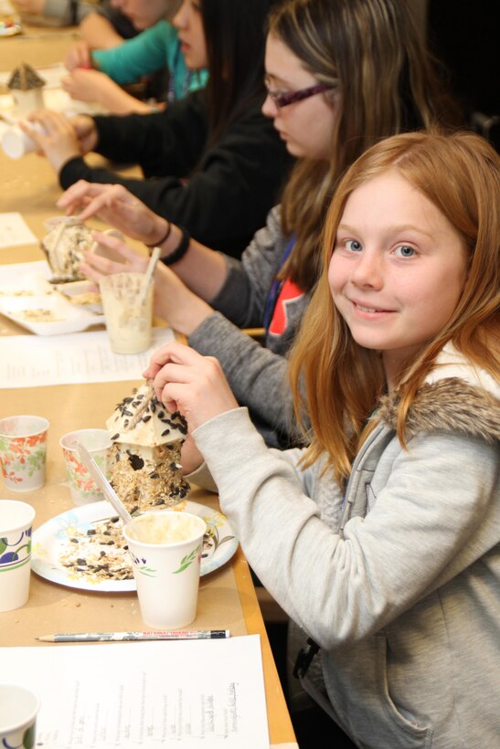 The children  make birdhouses during the Take Your Daughters and Sons to Work STEM event, April 24, 2015.