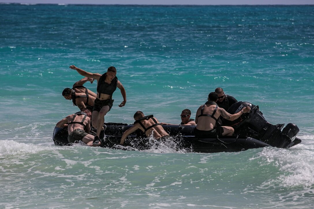 U.S. Marines with the 15th Marine Expeditionary Unit’s Maritime Raid Force security element practice surf passage procedures aboard Bellows Air Force Station, Hawaii, May 15, 2015. The security element Marines learned broaching procedures as well as flipping the CRRC over for situations when it is swamped with water. (U.S. Marine Corps photo by Cpl. Anna Albrecht/Released)