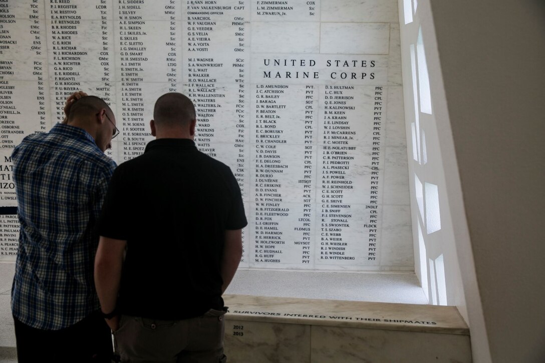 U.S. Marines with the 15th Marine Expeditionary Unit’s Maritime Raid Force visit the USS Arizona Memorial at Pearl Harbor in Honolulu, Hawaii, May 16, 2015. The memorial is built over the remains of the sunken battleship where 1,177 crewmen were killed on Dec. 7, 1941. (U.S. Marine Corps photo by Cpl. Anna Albrecht/Released)