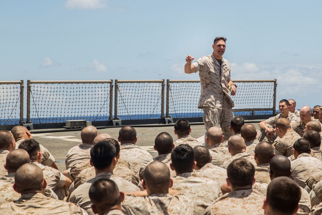 U.S. Marine Col. Vance L. Cryer addresses Marines about expectations while deployed aboard the USS Rushmore (LSD 47) at sea in the Pacific Ocean, May 16, 2015. Cryer is the commanding officer of the 15th Marine Expeditionary Unit. During his visit, Cryer observed day-to-day operations aboard the USS Rushmore. (U.S. Marine Corps photo by Sgt. Emmanuel Ramos/Released)