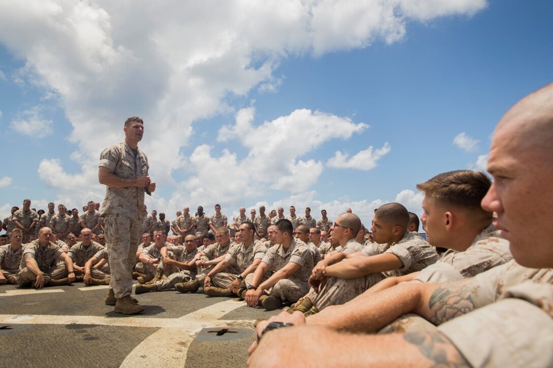 U.S. Marine Col. Vance L. Cryer addresses Marines about expectations while deployed aboard the USS Rushmore (LSD 47) at sea in the Pacific Ocean, May 16, 2015. Cryer is the commanding officer of the 15th Marine Expeditionary Unit. During his visit, Cryer observed day-to-day operations aboard the USS Rushmore. (U.S. Marine Corps photo by Sgt. Emmanuel Ramos/Released)