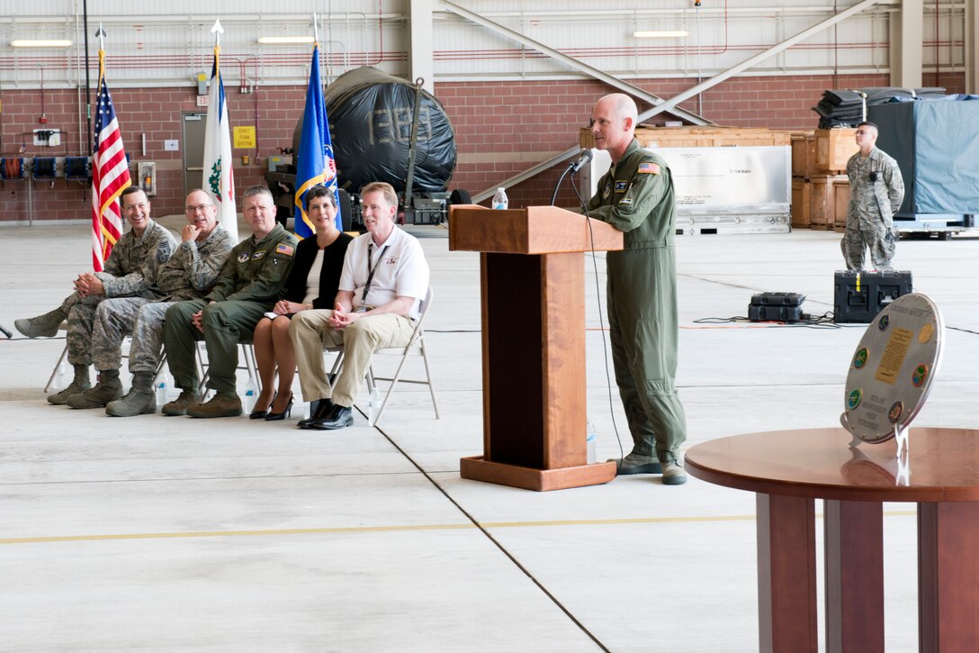 Col. Shaun Perkowski, 167th Airlift Wing commander, gives his remarks during a ceremony marking the end of a 52 year partnership between the 167th Airlift Wing and Lockheed Martin at the Martinsburg, W.Va. unit, May 19. Seated to the left are Chief Master Sgt. Ron Glazer, 167th Airlift Wing command chief, Col. Keith Snyder, 167th Maintenance Group commander, Lt. Col. Stuart Brown, 167th Operations Group deputy commander, Kim Mazur, left, program director for Lockheed Martin,  and Chuck LaFavre, Lockheed Martin Martinsburg C-5 systems engineer. The wing is in conversion from C-5 Galaxy aircraft to C-17 Globemaster III aircraft. The last C-5 assigned to wing departed May 20 for the 309th Aerospace Maintenance and Regeneration Group at Davis-Monthan Air Force Base. (photo by Master Sgt. Emily Beightol-Deyerle/released)