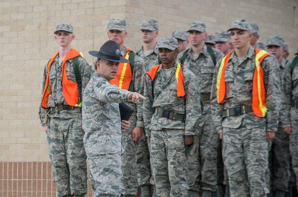 Tech. Sgt. Jason Kadisak, 331st Training Squadron military training instructor, provides marching instructions to newly arrived Air Force basic trainees May 20, 2015, at Joint Base San Antonio-Lackland, Texas.  Military training instructors are vital to maintaining the world’s greatest Air Force. In 7 ½ weeks, MTIs transform America’s sons and daughters from civilians into Airmen by instilling discipline, attention to detail, esprit de corps and challenging them physically and mentally. (U.S. Air Force photo by Johnny Saldivar/released)