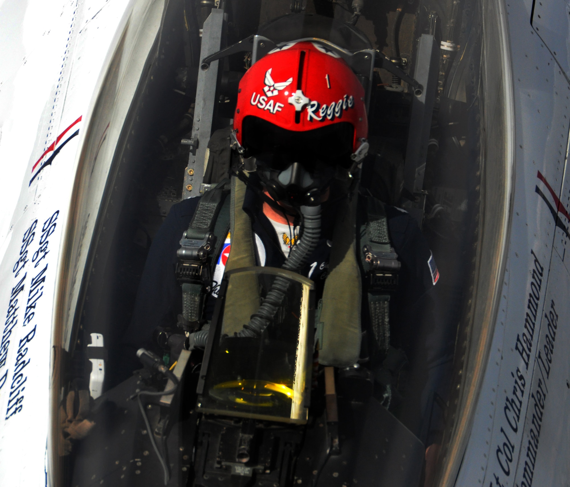 Lt. Col. Christopher Hammond, commander/leader of the U.S. Air Force Thunderbird Demonstration Squadron, peers up from the canopy of his F-16 Fighting Falcon aircraft while being refueled in flight by a KC-135 Stratotanker from McConnell Air Force Base, Kan., May 21, 2015.  The KC-135 was one of two McConnell tankers providing cross-country air refueling support for the Thunderbirds. The KC-135 aircrews, all Air Force Reservists from the 931st Air Refueling Group, provided several air refuelings for the Thunderbirds, taking them from Nellis AFB, Nev., to Long Island MacArthur Airport, Islip, N.Y., ensuring the demonstration team made it to their May 23 flight demonstration at the Jones Beach Air Show in Wantagh, N.Y. (U.S. Air Force photo by Capt. Zach Anderson)  