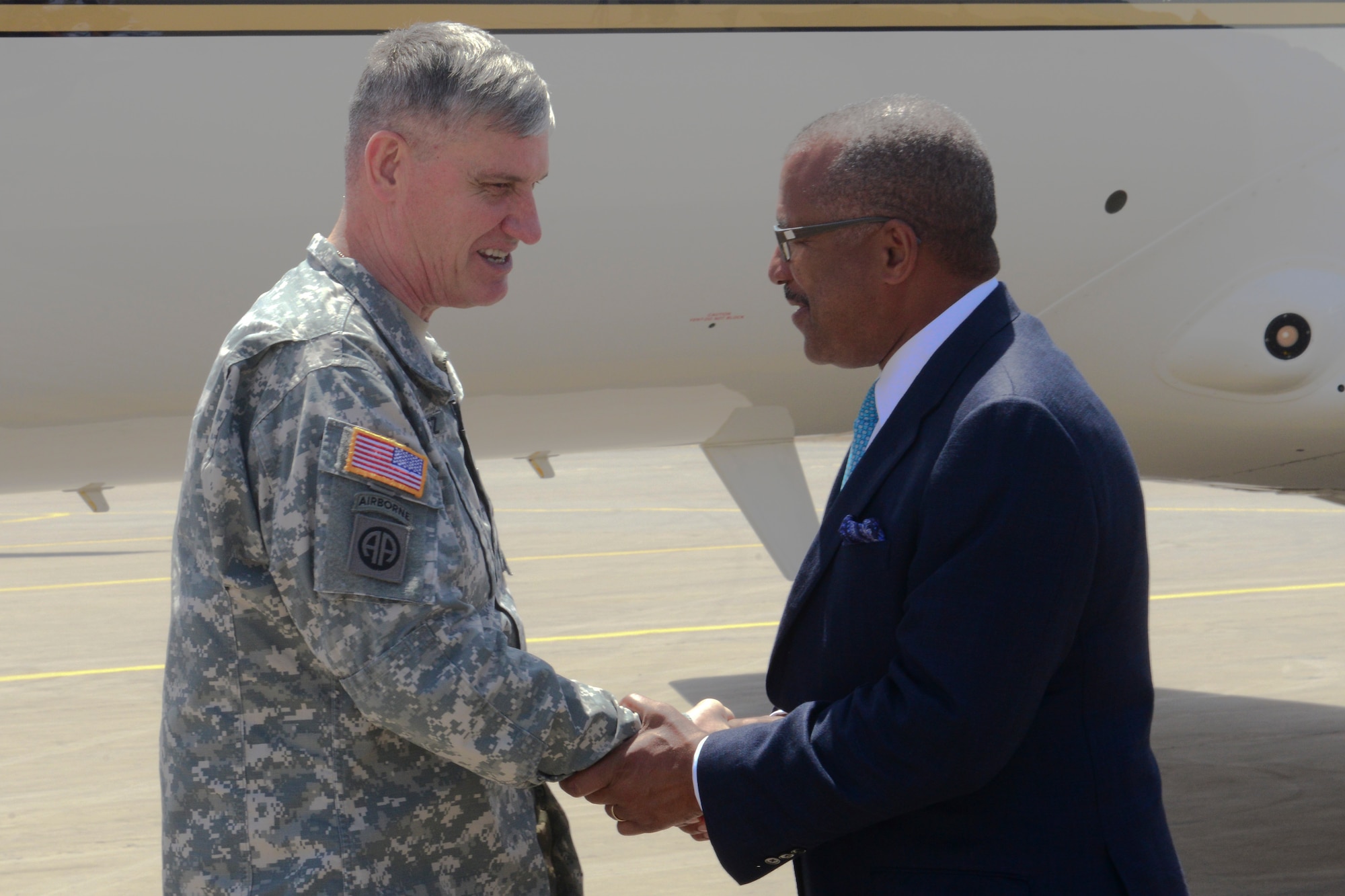 U.S. Army Gen. David Rodriguez, African Command commander, is greeted by Dwight Bush, U.S. Ambassador to the Kingdom of Morocco, at Ben Guerir Air Base, Morocco, May 20, 2015. Rodriguez received a base tour and an briefing on Exercise African Lion air training exercise. Exercise African Lion is a U.S. Marine Corps led event with participation from the U.S. Army, German Armed Forces, British Armed Forces, Netherlands, Belgium, Senegal and Tunisia.. (U.S. Air Force photo by Staff Sgt. Eboni Reams/Released)